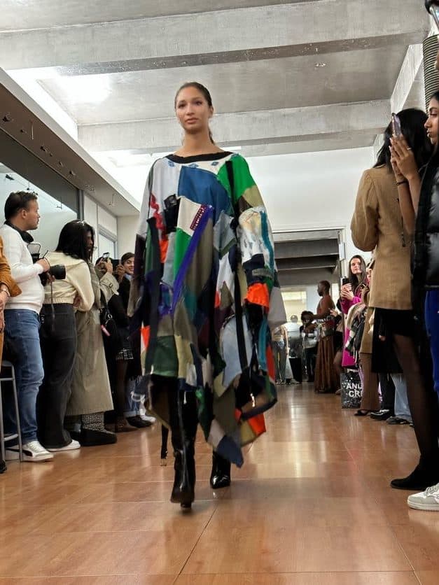 Design created by IFA Paris students Alexane Chaponot, Gaia Brogiotti and Zina Husseini. Cape made of patchwork of fabric scraps.